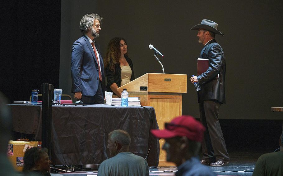 David and Erin Clements greet Otero County Commissioner Couy Griffin - who was removed from office this week for his role in the Jan. 6 riot- after a special meeting of the Otero County Board of Commissioners in Alamogordo. 