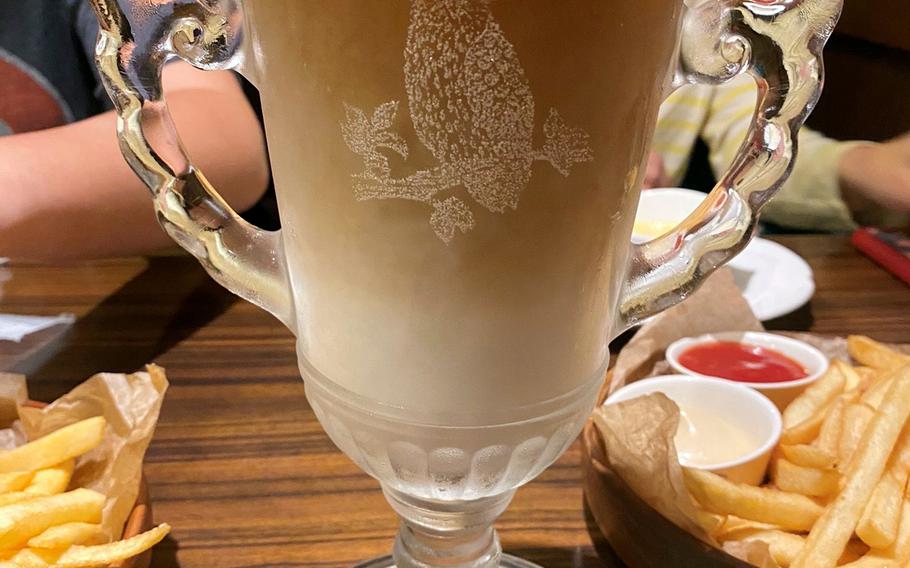 The “bikkuri” size ice cafe latte from Japanese hamburger steak chain Bikkuri Donkey. 