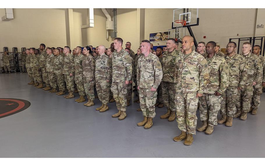 New York Army National Guard Soldiers of the 27th Infantry Brigade Combat Team, who are deploying to Germany as part of the Joint Multinational Training Group-Ukraine, stand at attention during a farewell ceremony at the Thompson Road Armory in Syracuse, New York on July 15, 2022.