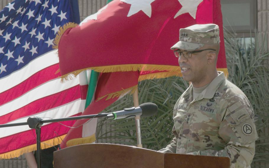 Army Lt. Gen. Ronald Clark speaks on the 20th anniversary of the 9/11 attacks during a ceremony at Camp Arifjan, Kuwait, Sept. 11, 2021.