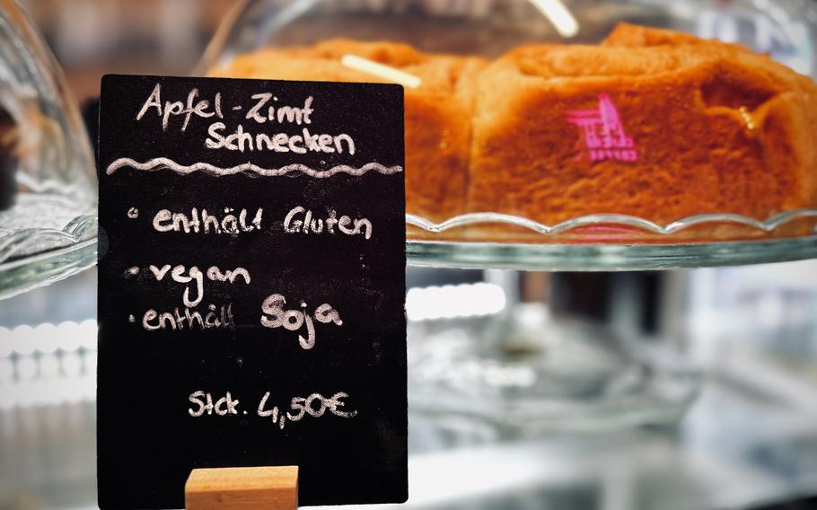 A sign shows featured food items.