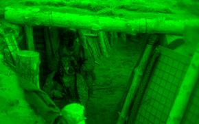 Members of the U.S. Army’s 10th Special Forces Group (Airborne) and NATO partner forces clear a trench at night during training at an undisclosed location in Poland on April 14, 2025.