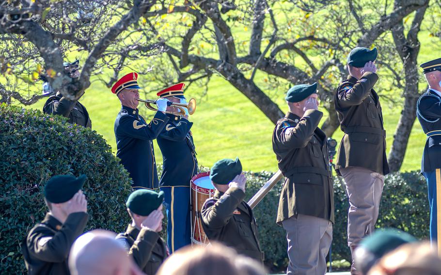 Taps is played on Wednesday, Nov. 8, 2023, at Arlington National Cemetery, where Army Green Berets held a wreath laying ceremony to commemorate former President John F. Kennedy’s contributions to Special Forces. The ceremony took place at Arlington’s Eternal Flame, a memorial at JFK’s gravesite. The former president was assassinated six decades ago on Nov. 22, 1963.