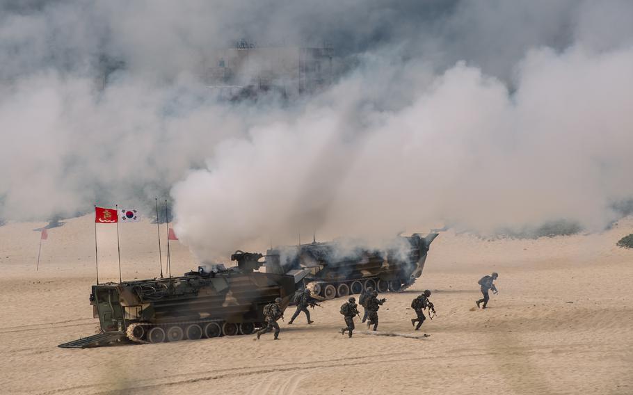 South Korean marines exit their amphibious assault vehicles during the Rim of the Pacific 2022 exercise on Marine Corps Base Hawaii on July 30, 2022.