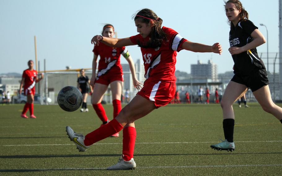 Julia Blackwell kicks the ball.