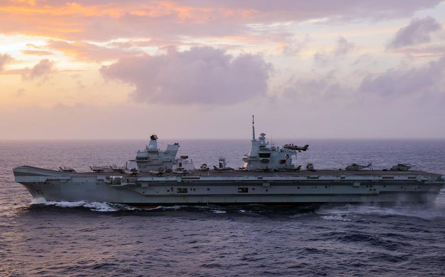 The aircraft carrier HMS Queen Elizabeth, pictured here sailing through the South China Sea last week, made a port call at U.S. Naval Base Guam on Friday, Aug. 6, 2021.