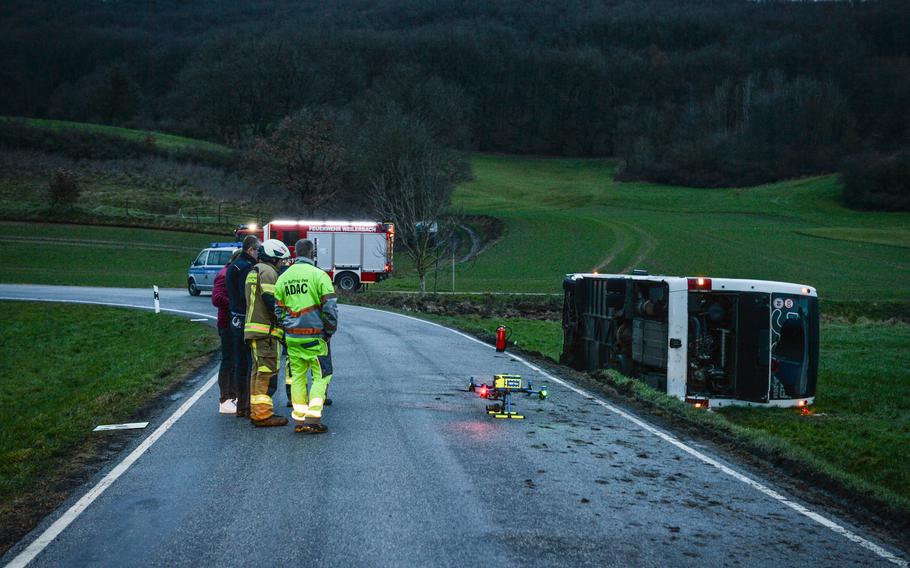 Investigators launch a drone March 10, 2023, to collect aerial images of the scene where a bus carrying Defense Department school students overturned near Weilerbach, Germany.