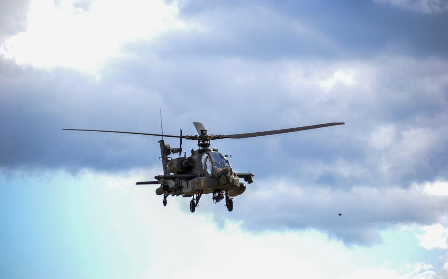 An Army AH-64E Apache Guardian helicopter participates in exercise Defender Europe in Drawsko Pomorskie, Poland, in May 2022. The Germany-based 12th Combat Aviation Brigade received the first of 24 new AH-64E helicopters last week.