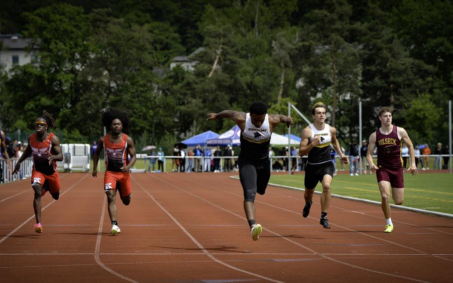 Stuttgart’s Alex Guthrie surges over the finish line to win the boys 200 meter finals, followed closely by teammate Daniel Greer, at the 2024 DODEA European Championships at Kaiserslautern High School in Kaiserslautern, Germany, on May 24, 2024. Both athletes achieved personal records, with Guthrie at 22.54 seconds and Greer at 23.03 seconds.