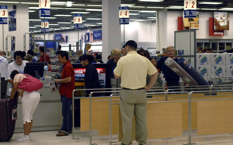 Shoppers wait in the checkout line at the Kaiserslautern Military Community Center exchange at Ramstein Air Base, Germany. Army and Air Force Exchange Service employees at sites in the Kaiserslautern area are joining the American Federation of Government Employees after voting Dec. 15, 2023, to unionize.