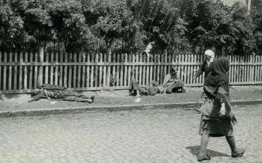 Starved peasants are seen on a street in Kharkiv, Ukraine, in 1933.