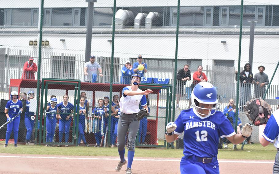 Parker Ingram beats the throw to first from Wiesbaden pitcher Lyndsey Urich  in the DODEA-Europe Division I softball championship game Saturday, May 20, 2023, at Kaiserslautern, Germany.
