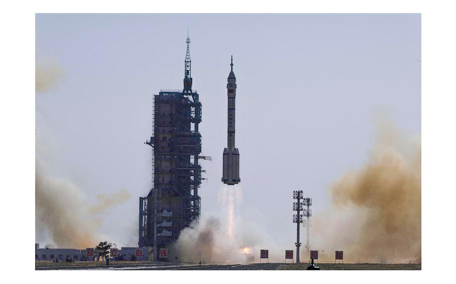 A Long March-2F carrier rocket, carrying the Shenzhou-17 spacecraft and a crew of three astronauts, lifts off from the Jiuquan Satellite Launch Centre in the Gobi desert, in northwest China on Oct. 26, 2023.