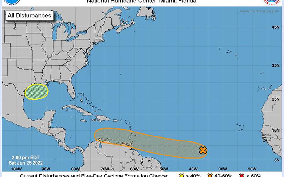 The tropical outlook as of 2 p.m. ET on Saturday June 25, shows two systems with potential for development. (NOAA/National Hurricane Center/TNS)