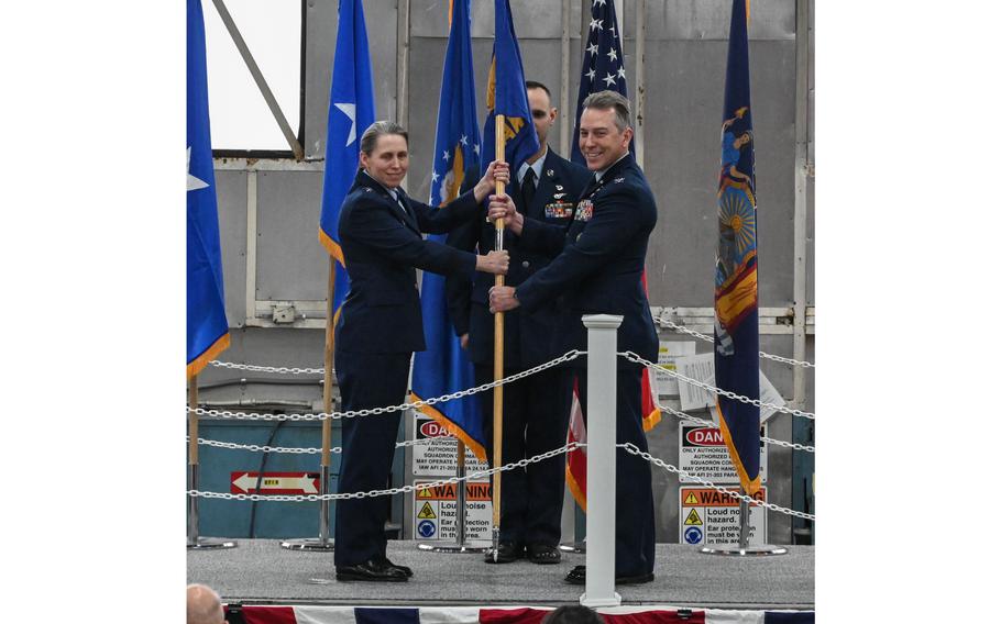 U.S. Air Force Col. Robert Donaldson, right, receives the guidon of the New York Air National Guard’s 109th Airlift Wing from Maj. Gen. Denise Donnell, the New York Air National Guard commander, during change of command ceremonies at Stratton Air National Guard Base in Scotia, N.Y., on Saturday, March 2, 2024. During the ceremony, command passed from Col. Christian Sander to Donaldson.