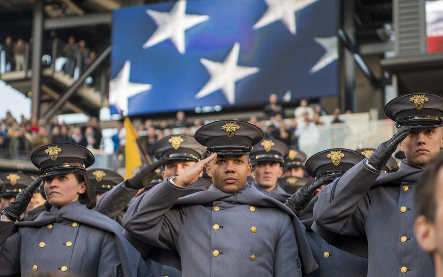 Army Academy cadets salute during the playing of the National Anthem at Lincoln Financial Field in Philadelphia, where the annual Army-Navy game was played on Saturday, Dec. 10, 2022. 