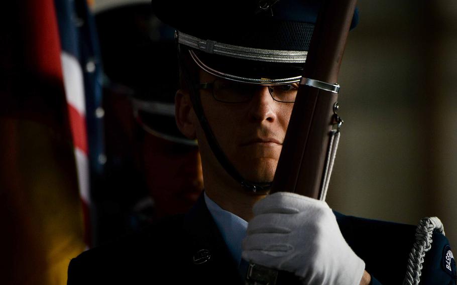 A member of the 52nd Fighter Wing's honor guard marches during the presentation the colors at a change of command ceremony June 2, 2023, at Spangdahlem Air Base, Germany. Col. Leslie Hauck relinquished command to Col. Kevin Crofton.