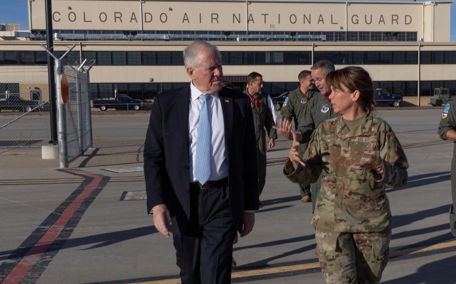Air Force Secretary Frank Kendall receives a tour of a mobile ground station on Nov. 3, 2023, from Air Force Col. Stephanie Figueroa, commander of the 233rd Space Group at Buckley Space Force Base, Colo.