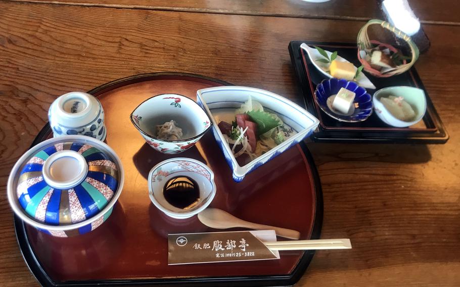 The staple Hattori-zen meal from Obi Hattori-tei in Japan's Miyazaki prefecture includes sashimi, sushi, savory egg and dengaku roasted dishes. 