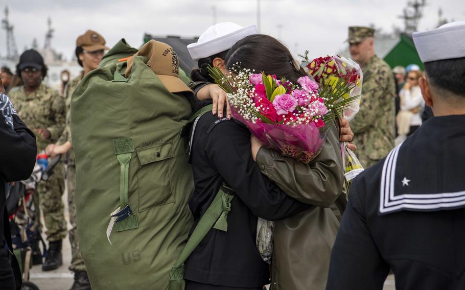 Sailors assigned to amphibious assault carrier USS Tripoli (LHA 7) are reunited with family and friends upon Tripoli’s return to homeport, Tuesday, Nov. 29, 2022.