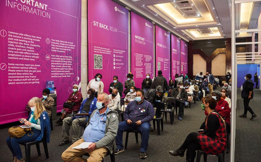 Residents wait in an observation area following their COVID-19 vaccine Johannesburg, South Africa, on July 8, 2021.