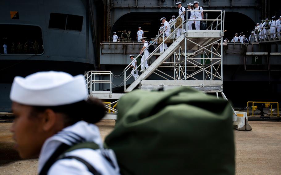 Sailors disembark from the USS Harry S. Truman at Naval Station Norfolk on Sept. 12, 2022. The National Defense Authorization Act directs around $250 million to construction projects at Portsmouth Naval Shipyard, Naval Station Norfolk, Dam Neck Naval Base, Naval Air Station Oceana, Langley-Eustis Air Force Base and Naval Support Activity of Hampton Roads.