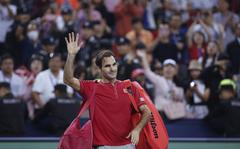 Roger Federer of Switzerland waves to spectators as he leaves the court after he lost to Alexander Zverev of Germany in their men's singles quarterfinals match at the Shanghai Masters tennis tournament at Qizhong Forest Sports City Tennis Center in Shanghai, China, Oct. 11, 2019. Federer announced Thursday, Sept. 15, 2022 he is retiring from tennis. 