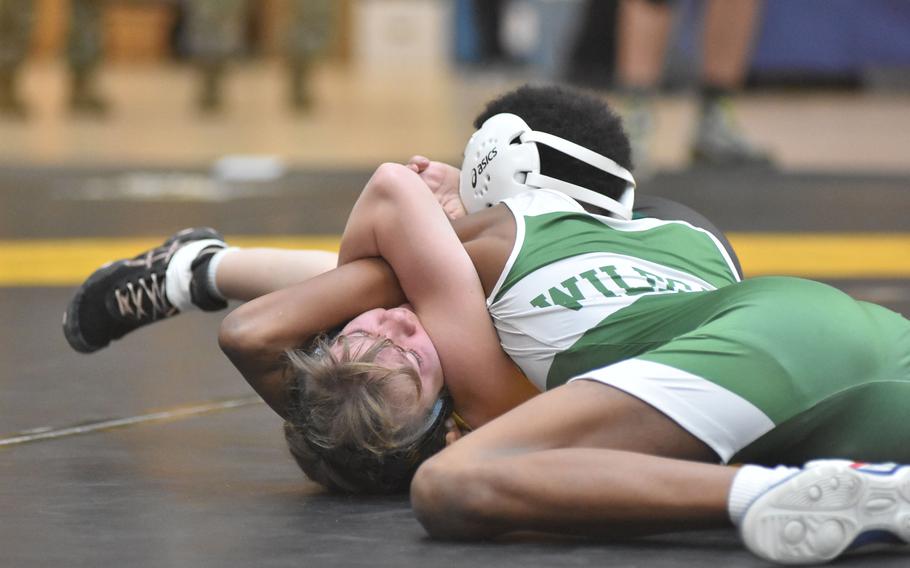 Naples’ DeShaun Bowie earned a major decision over SHAPE’s Penelope Gomlak to open the DODEA European Wrestling Championships at 106 pounds Friday, Feb. 9, 2024.