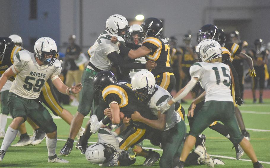 When either team tried to gain ground up the middle Friday night, there were a lot of Cougars crashing into Wildcats. Naples downed Vicenza 40-0.
