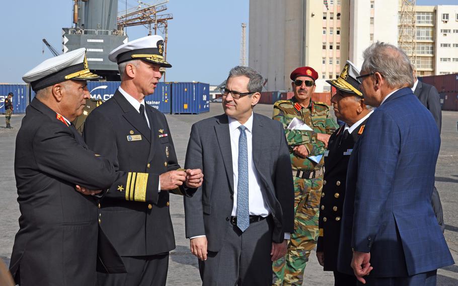 U.S. Navy leaders and public officials greeting Libyan military and civilian officials.
