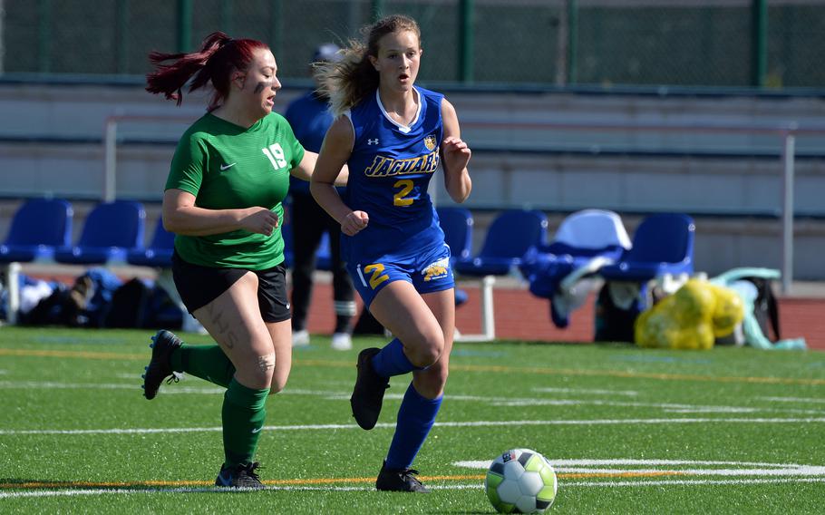 Alconbury’s Reagan Boyett and Sigonella’s Isabella Naselli battle for the ball in the girls Division III finals at the DODEA-Europe soccer championships in Ramstein, Germany, May 18, 2023. Sigonella won 4-2 to take the crown.