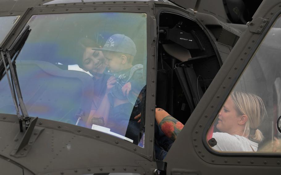 Visitors get a close-up look at military vehicles, helicopters and other equipment at the German-American Volksfest on Aug. 5, 2023, in Camp Algiers, Grafenwoehr, Germany.