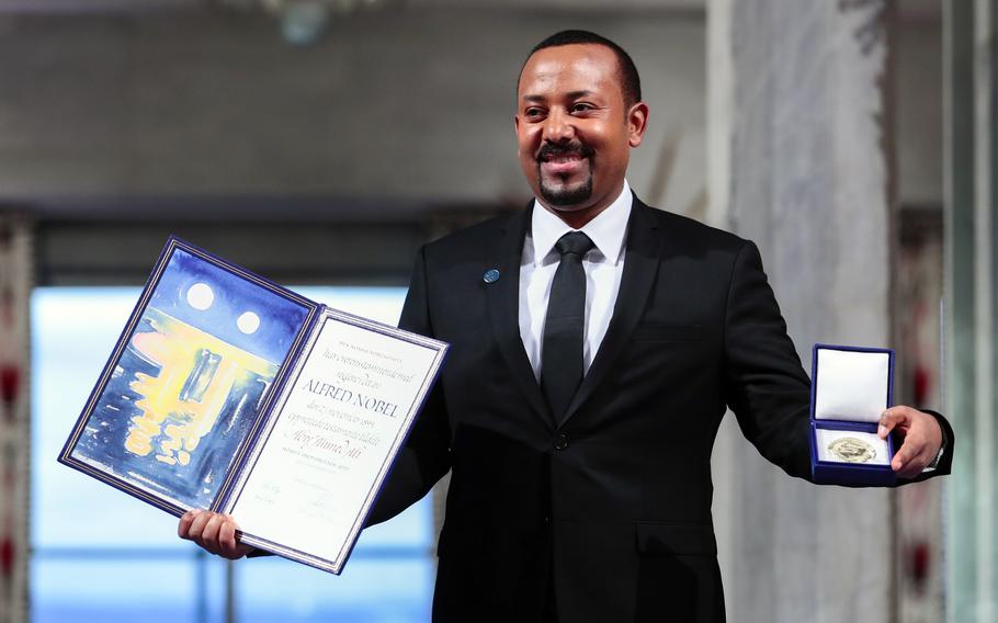 Ethiopia’s Prime Minister Abiy Ahmed poses for the media after receiving the Nobel Peace Prize during the award ceremony in Oslo City Hall, Norway, on Dec. 10, 2019. The Norwegian Nobel Committee on Thursday Jan. 13, 2022, issued a rare admonition to Abiy over the war and humanitarian crisis in his country’s Tigray region. 