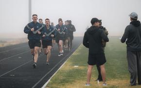 Airmen run during a physical fitness assessment at Fairchild Air Force Base, Wash., on Oct. 29, 2024. A screenshot purporting to show upcoming changes to the Air Force fitness test program was published on social media.