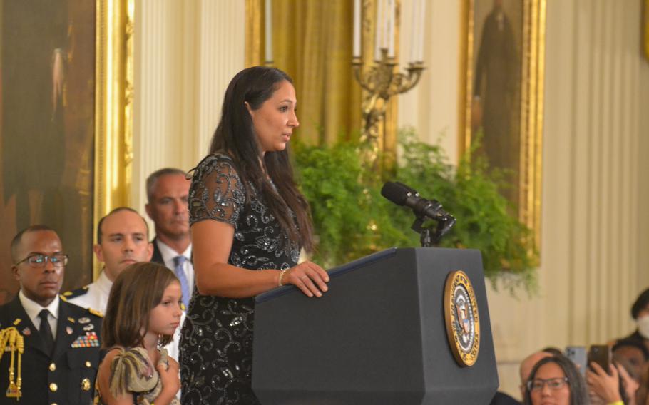 Danielle Robinson, the widow of Sgt. 1st Class Heath Robinson, for which the PACT Act was named, introduces President Joe Biden at the White House during the signing ceremony for The Sergeant First Class Heath Robinson Honoring Our Promise to Address Comprehensive Toxics Act of 2022, Wednesday, Aug. 10, 2022. Heath was diagnosed with a rare autoimmune disorder and lung cancer after serving with the Army National Guard in Kosovo and Iraq, where he experienced prolonged exposure to burn pits. He died in 2020. 