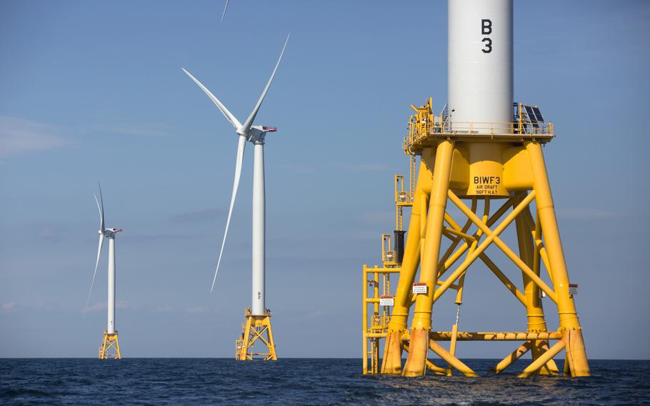 In this Aug. 15, 2016 file photo, three of Deepwater Wind’s five turbines stand in the water off Block Island, R.I, the nation’s first offshore wind farm.  Interior Secretary Deb Haaland says the Biden administration will hold lease sales for up to seven offshore wind farms on the East and West coasts and in the Gulf of Mexico in the next four years. The projects are part of the administration’s plan to deploy 30 gigawatts of offshore wind energy by 2030,  generating enough electricity to power more than 10 million homes.  