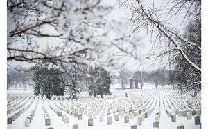 Snow falls in Section 33 of Arlington National Cemetery, Arlington, Virginia, March 21, 2018. This was the second day of spring when a snow storm hit the national capital region. (U.S. Army photo by Elizabeth Fraser / Arlington National Cemetery / released)