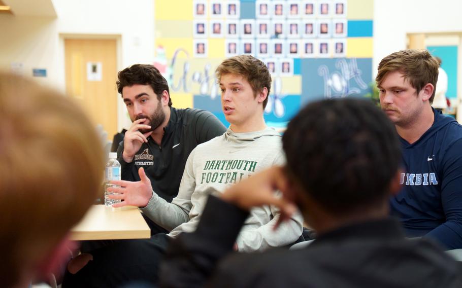 Ivy League football players take part in a Q&A session with members of the Yokota High School Panthers at Yokota Air Base, Japan, Jan. 19, 2024.