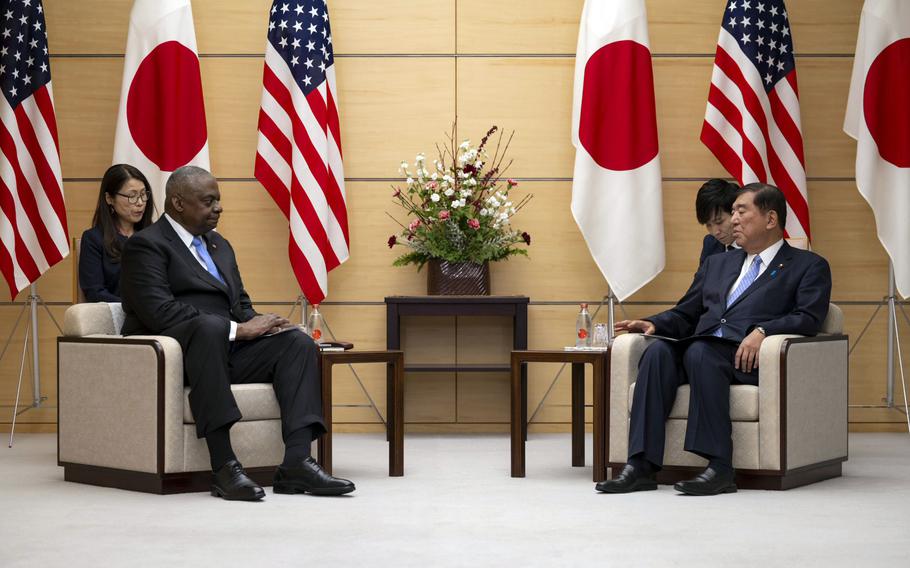 Secretary of Defense Lloyd Austin meets with Japanese Prime Minister Shigeru Ishiba in Tokyo, Dec. 10, 2024.