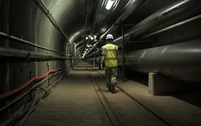 A sailor walks a portion of the 7 miles of tunnels that are part of the Red Hill Underground Fuel Storage Facility in Honolulu, Hawaii, July 17, 2020.