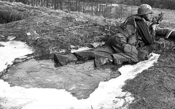 West Germany, February 1982: A soldier looks out from an icy perch during a crew maneuver course at the Wildflecken Training Area. The 10-day program of tactical scenarios, in which nine platoons took part, included a forced march, live-fire exercises, and day-and-night navigation. 

Looking for Stars and Stripes’ historic coverage? Subscribe to Stars and Stripes’ historic newspaper archive! We have digitized our 1948-1999 European and Pacific editions, as well as several of our WWII editions and made them available online through https://starsandstripes.newspaperarchive.com/

META TAGS: Germany; Cold War;  U.S. Army; military life; training; exercise; snow; winter; 