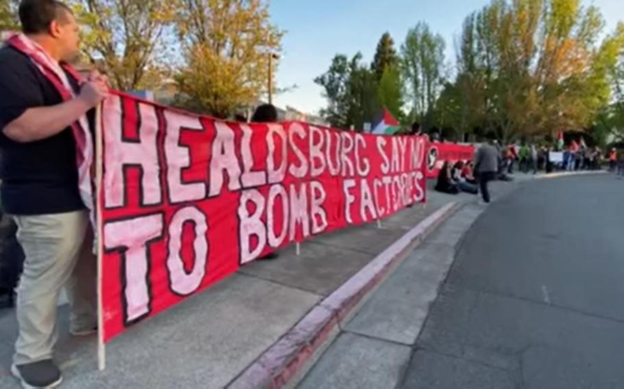 Demonstrators stage a blockade of U.S. weapons manufacturer General Dynamics in Healdsburg, Calif., Tuesday, April 16, 2024, in this screenshot from video.
