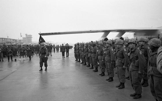 Troops from the 5th Surgical Hospital stationed in Ft. Knox, Kentucky stand in formation. Maj. Callie Carson- the only woman involved in Reforger I - is the chief nurse of the 5th.