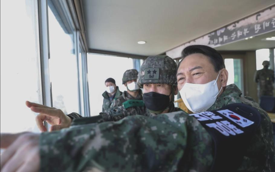 Yoon Seok Youl, at the time a presidential candidate, visits a South Korean military unit at the Demilitarized Zone between North and South Korea, Dec. 20, 2021. 