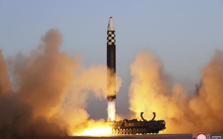This photo provided by the North Korean government shows what it says is an intercontinental ballistic missile in a launching drill at the Sunan international airport in Pyongyang, North Korea, Thursday, March 16, 2023.