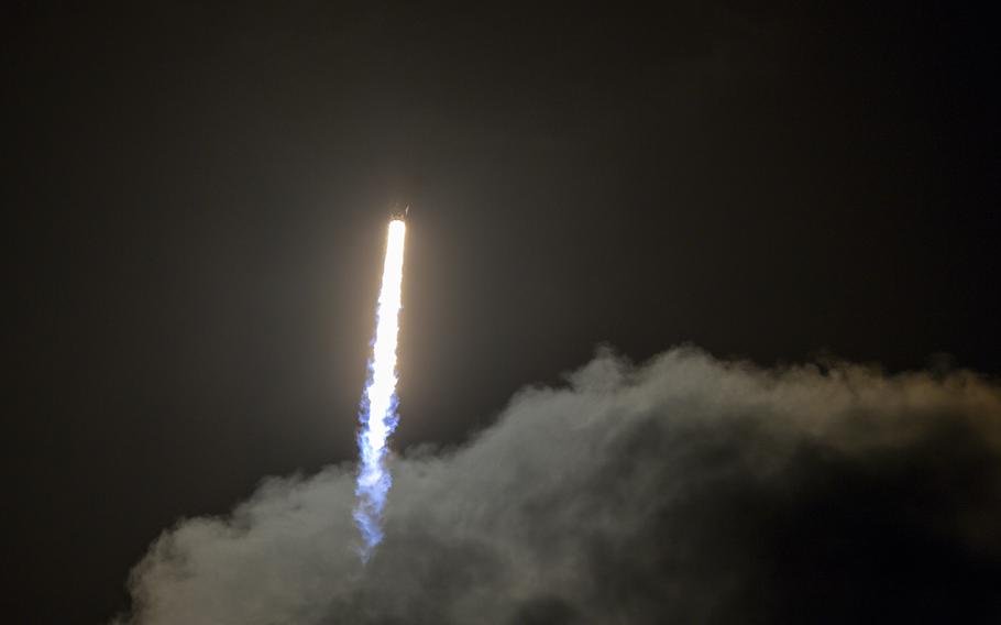 SpaceX's Falcon 9 booster carrying the Crew-2 astronauts to orbit is photographed on April 23, 2021, at Kennedy Space Center in Cape Canaveral, Fla.