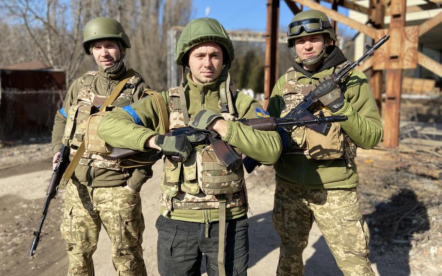 Taras Topolia with fellow Antytila bandmates and Ukrainian army volunteers Serhiy Vusyk and Dmytro Zholud.