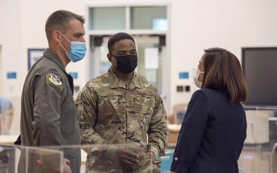 Yokota High School principal Rebecca Villagomez chats with base commander Col. Andrew Campbell, left, and Chief Master Sgt. Jerry Dunn on the first day of classes Monday, Aug. 23, 2021. 