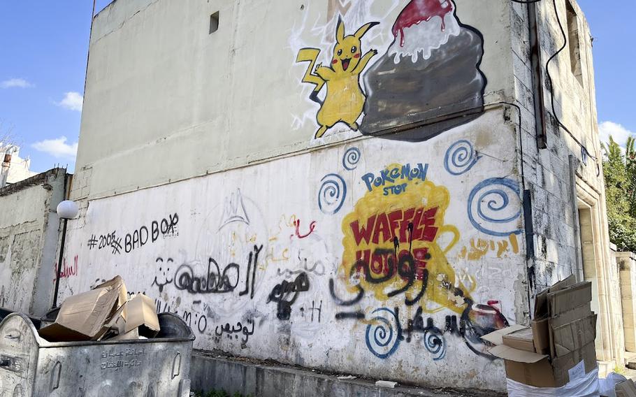 The walls on buildings near Rainbow Street in Amman, Jordan, are known for their colorful graffiti and street art.