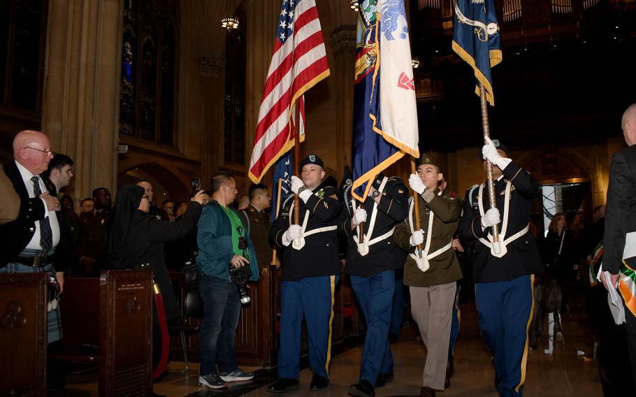 A U.S. Army color guard comprised of soldiers with the New York National Guard’s 1st Battalion, 69th Infantry Regiment, 27th Infantry Brigade Combat Team, 42nd Infantry Division, carry the nation, state, Army and unit flags into Saint Patrick’s Cathedral prior to the start of the New York City St. Patrick’s Day Parade, Saturday, March 16, 2024.